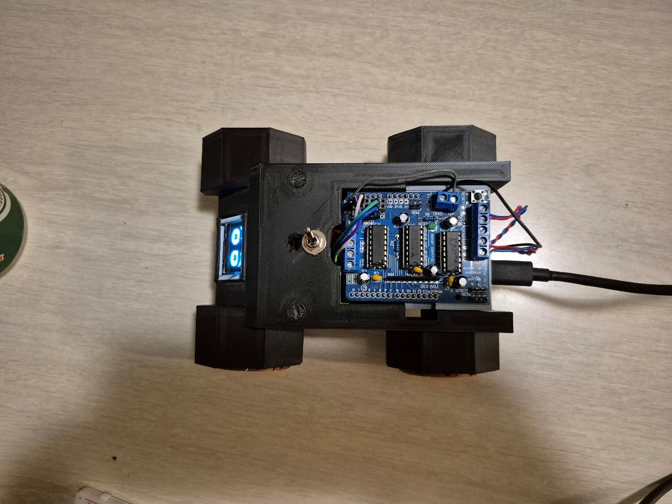 Top view of the robot showing Arduino and motor shield